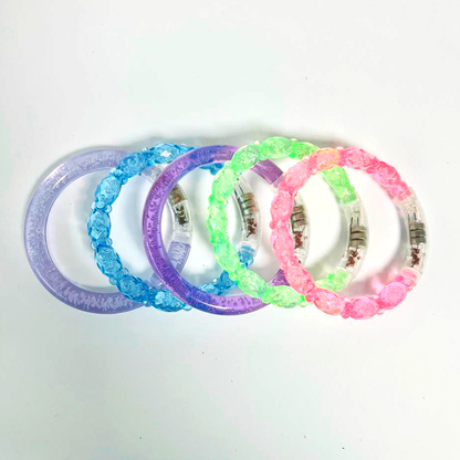 BRAZALETE de acrílico con luz LED 12 pzas.